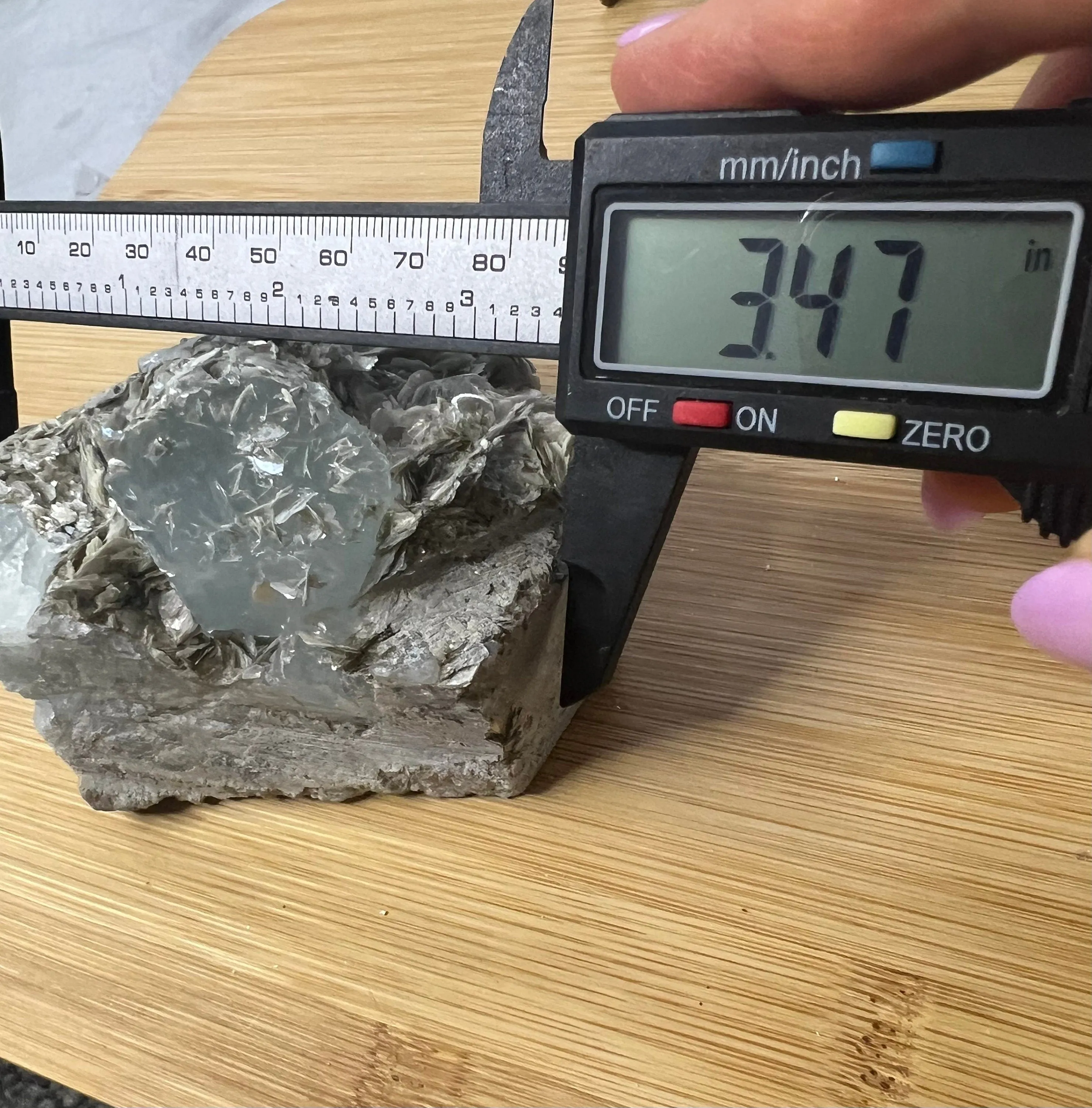 Aquamarine on muscovite 414grams cluster