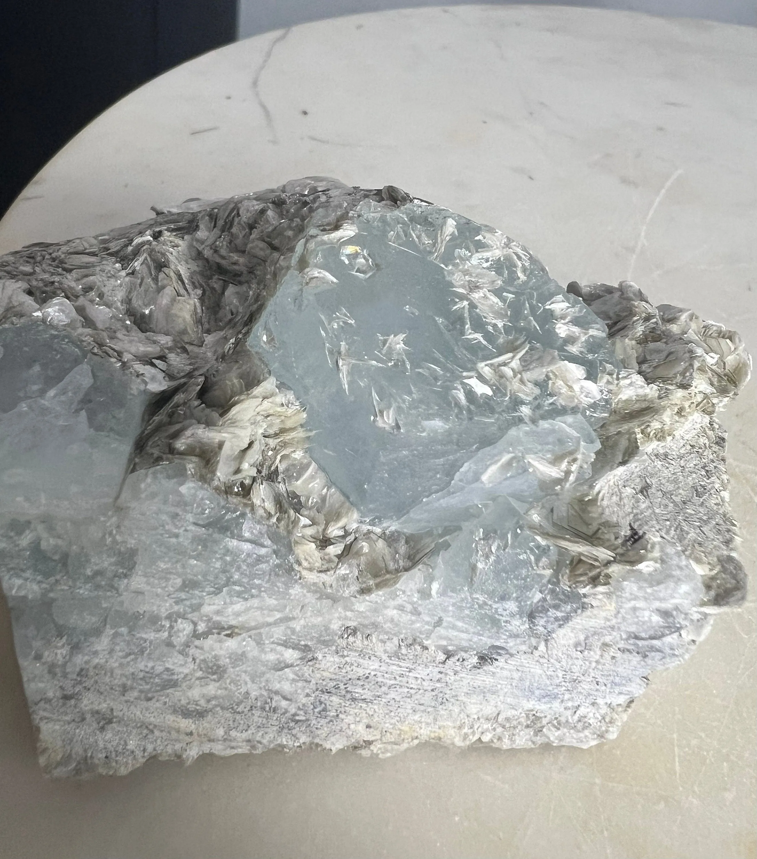 Aquamarine on muscovite 414grams cluster