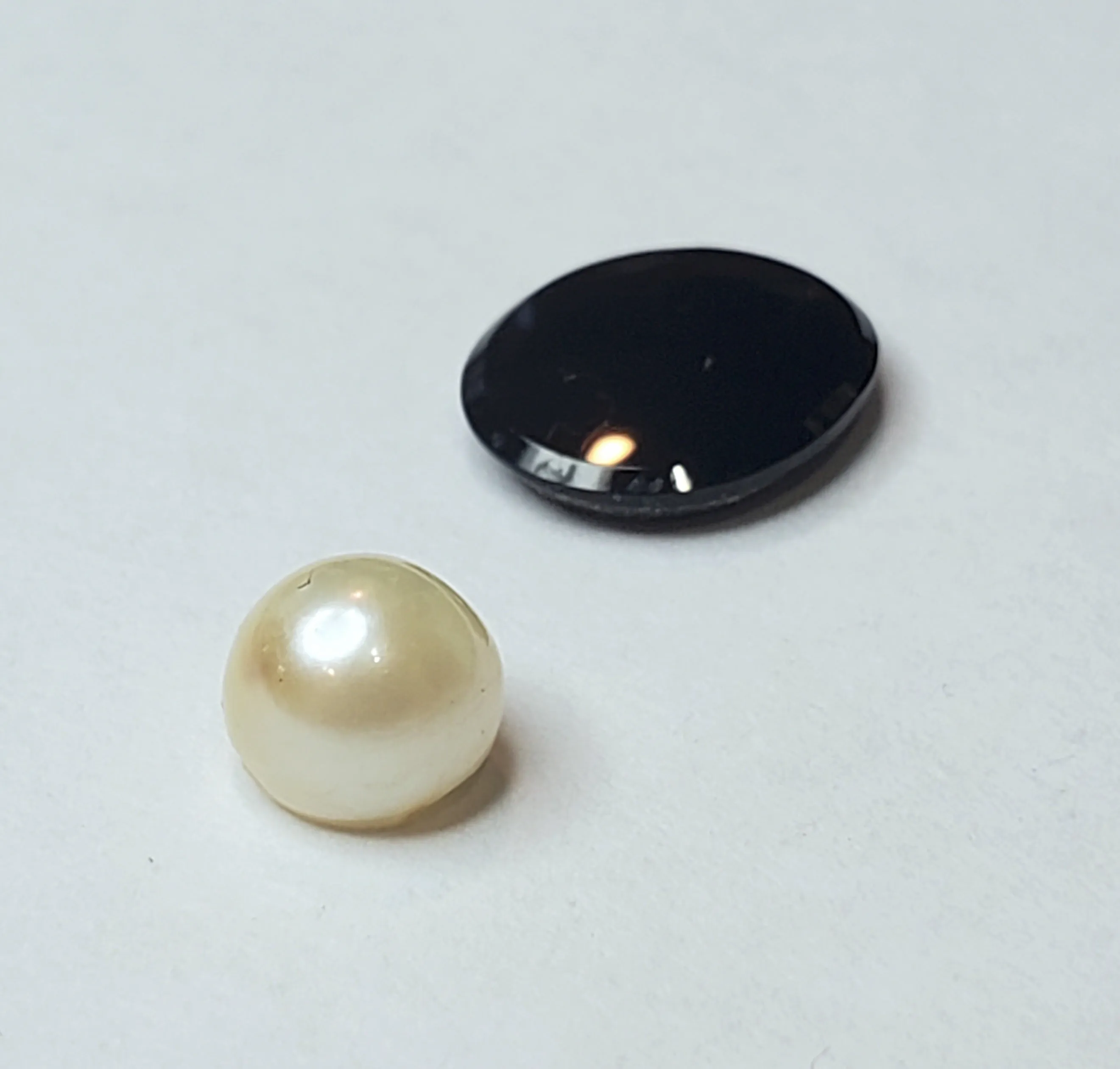 Black Onyx Oval Cabochon and Half-Drilled Cultured Pearl