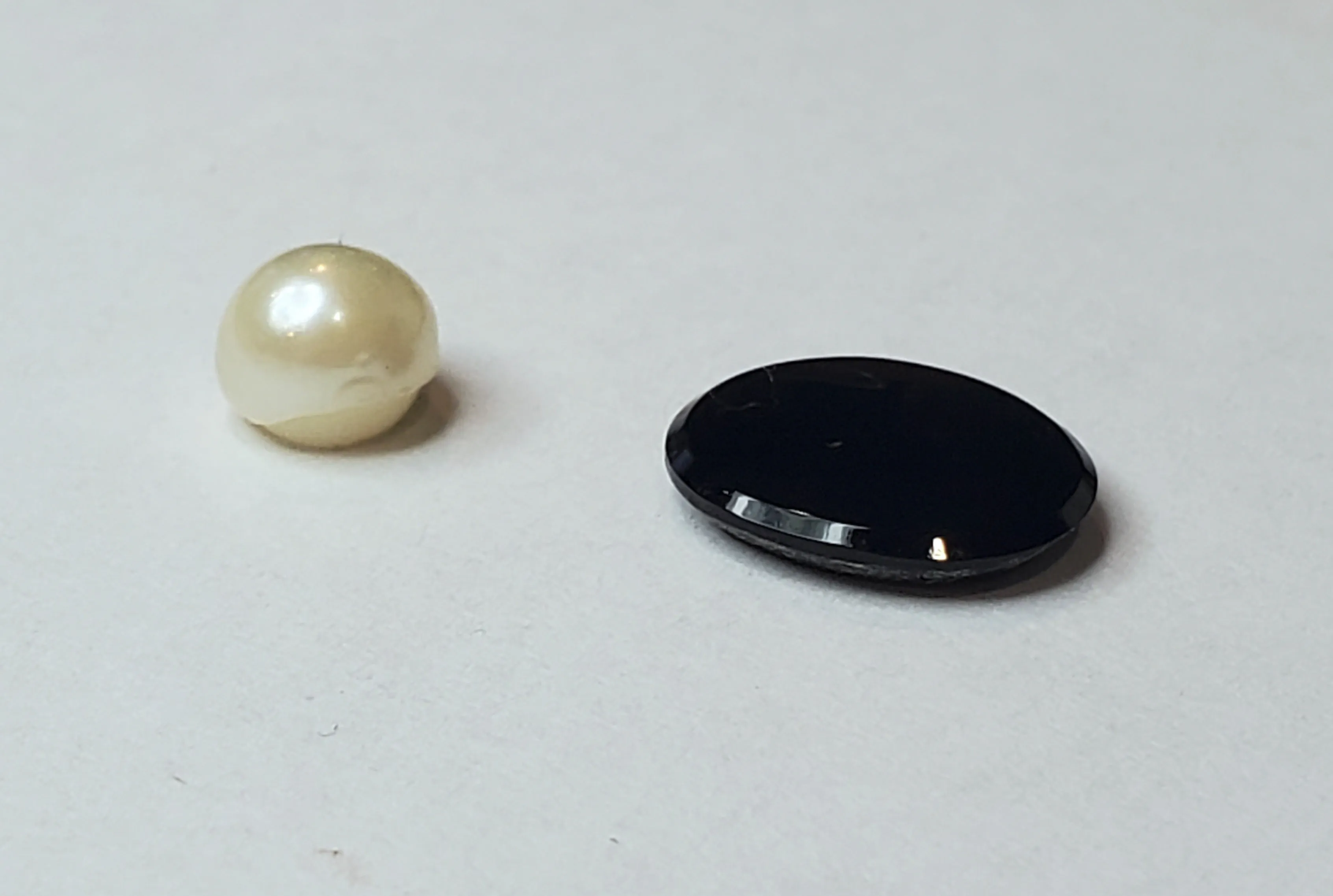 Black Onyx Oval Cabochon and Half-Drilled Cultured Pearl