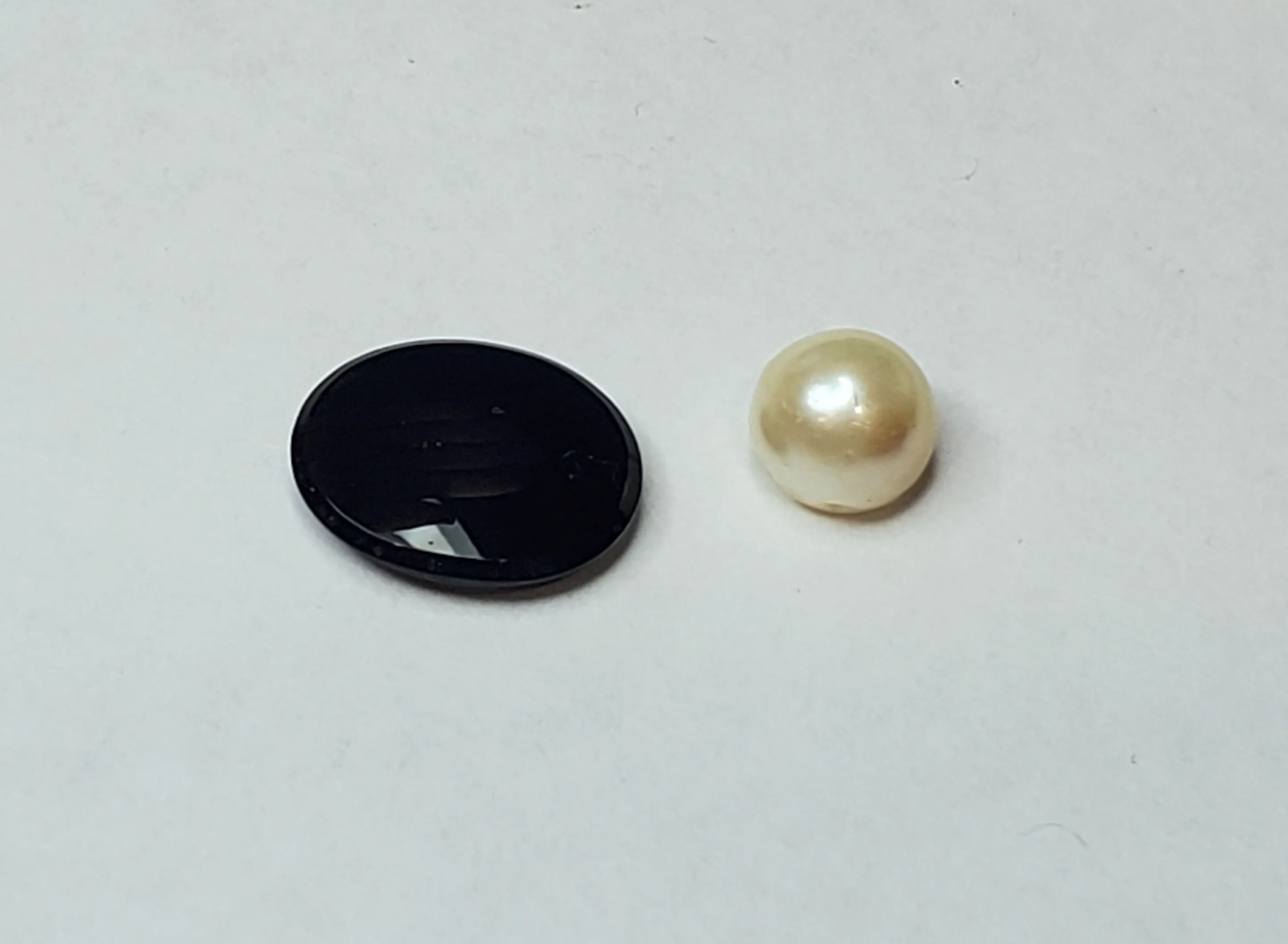 Black Onyx Oval Cabochon and Half-Drilled Cultured Pearl